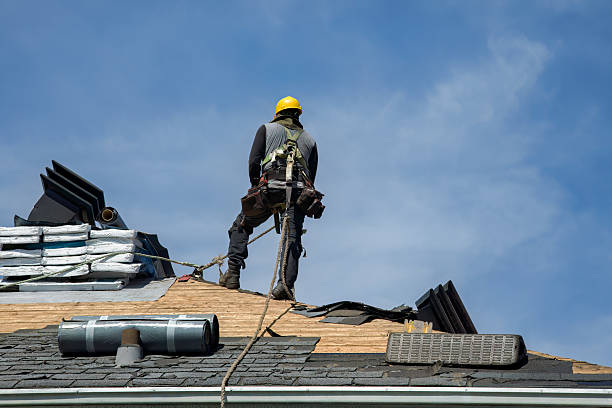 Professional Storm Damage Roof Repair technician working in Black Diamond, WA